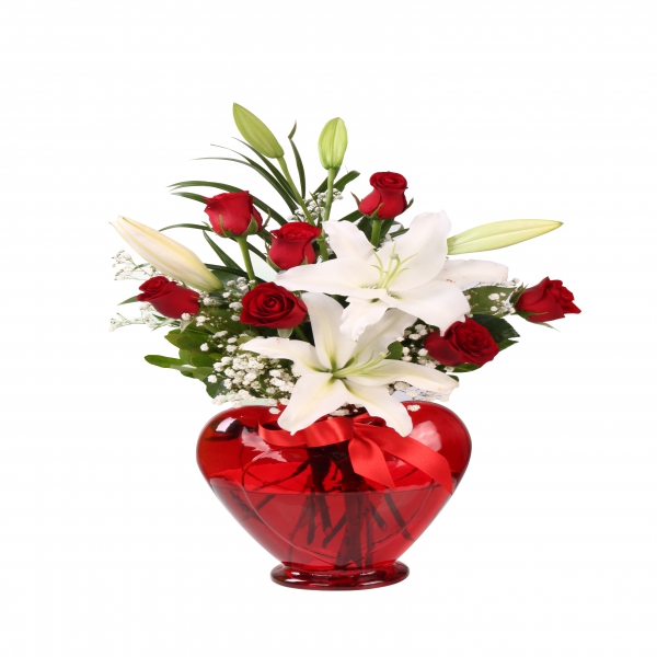  Заказ цветов в Белек  7 роз и лилий в вазе-сердечке